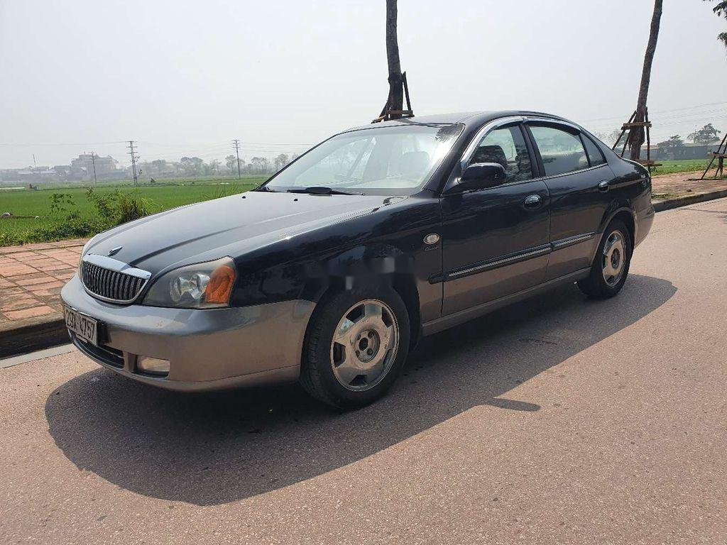 Daewoo Magnus 2005 - Bán ô tô Daewoo Magnus AT đời 2005, màu đen số tự động