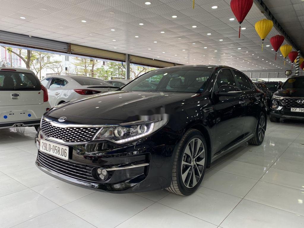 Kia Optima    2.0AT   2016 - Cần bán Kia Optima 2.0AT sản xuất năm 2016, màu đen, 690tr