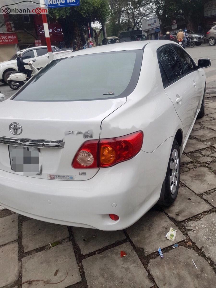 Toyota Corolla XLi 1.6 2010 - Xe Toyota Corolla sản xuất năm 2010, màu trắng, xe nhập số tự động giá cạnh tranh