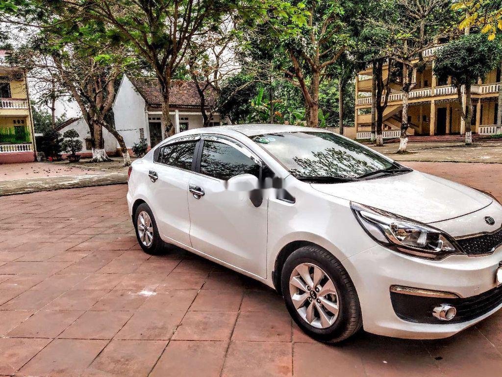 Kia Rio    2015 - Cần bán Kia Rio sản xuất 2015, màu trắng, xe nhập số tự động