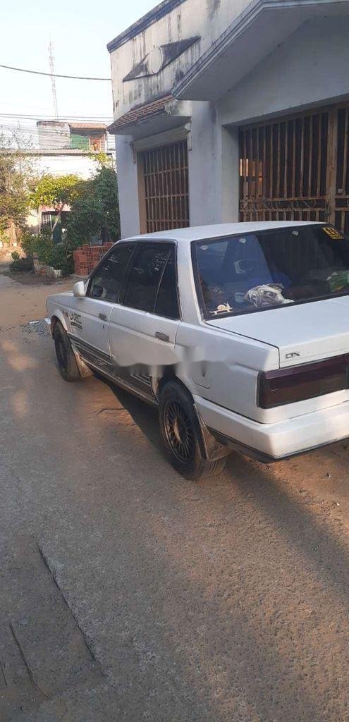 Nissan Sunny   1993 - Cần bán gấp Nissan Sunny đời 1993, màu trắng, nhập khẩu nguyên chiếc xe gia đình