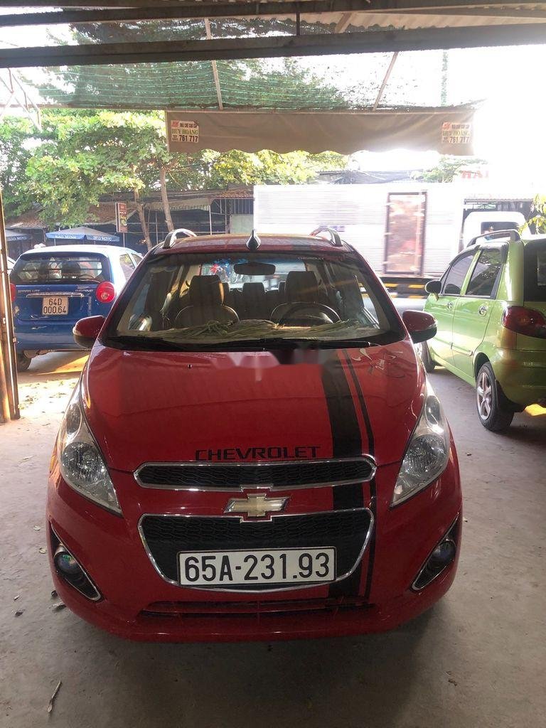 Chevrolet Spark 2015 - Bán ô tô Chevrolet Spark AT sản xuất 2015, màu đỏ số tự động