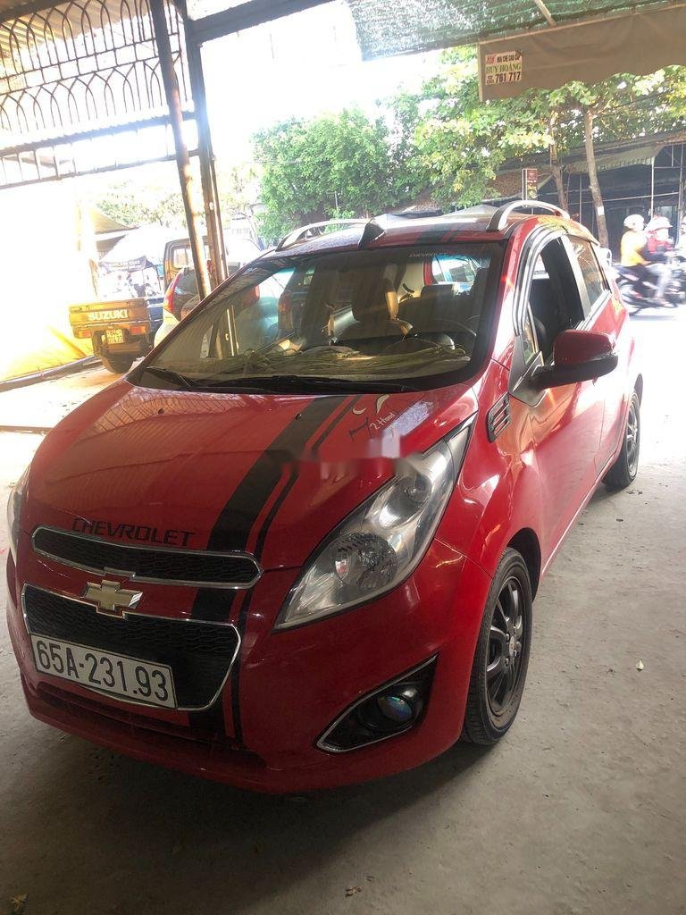 Chevrolet Spark 2015 - Bán ô tô Chevrolet Spark AT sản xuất 2015, màu đỏ số tự động