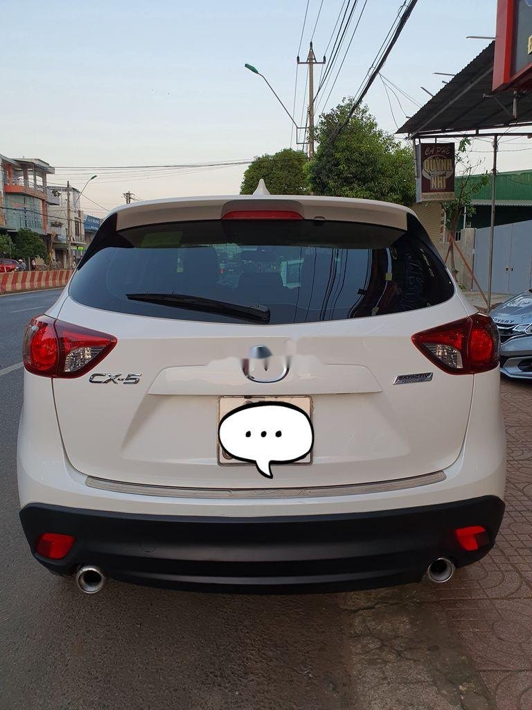 Mazda CX 5   2015 - Cần bán lại xe Mazda CX 5 đời 2015, màu trắng, 680 triệu