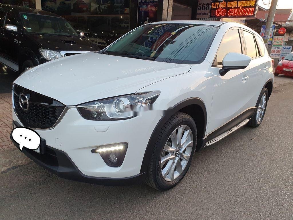 Mazda CX 5   2015 - Cần bán lại xe Mazda CX 5 đời 2015, màu trắng, 680 triệu