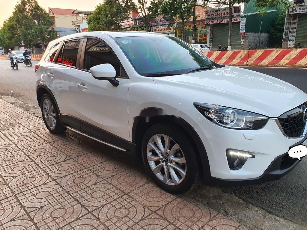 Mazda CX 5   2015 - Cần bán lại xe Mazda CX 5 đời 2015, màu trắng, 680 triệu