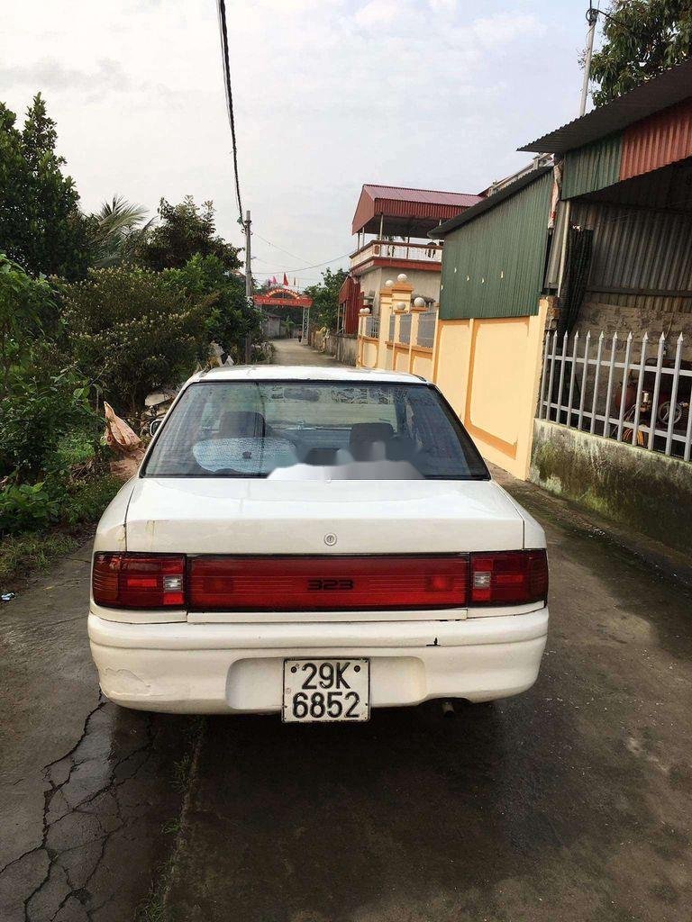 Mazda 323F   1996 - Bán Mazda 323F năm sản xuất 1996, màu trắng, xe nhập