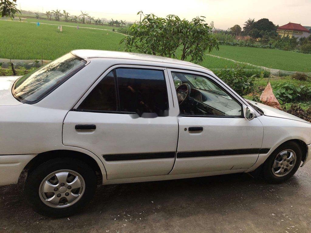 Mazda 323F   1996 - Bán Mazda 323F năm sản xuất 1996, màu trắng, xe nhập