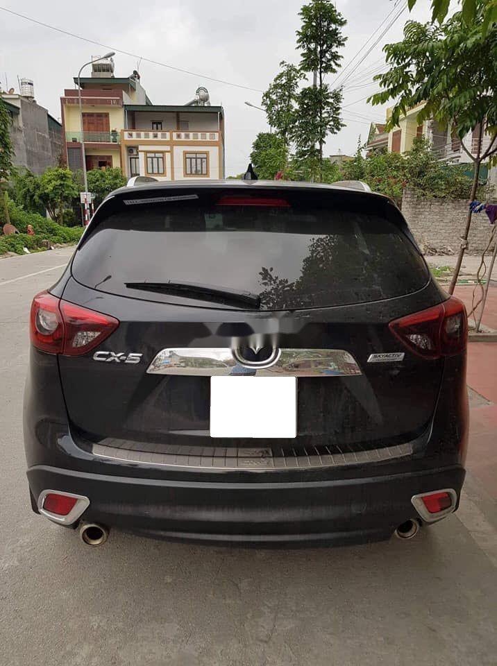 Mazda CX 5   2016 - Bán Mazda CX 5 sản xuất 2016, màu đen, 692tr