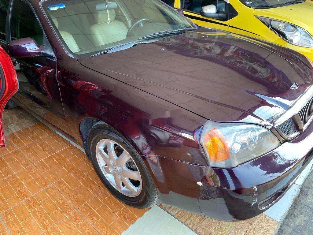 Daewoo Magnus   2004 - Cần bán gấp Daewoo Magnus đời 2004, màu đỏ, nhập khẩu nguyên chiếc, 92 triệu