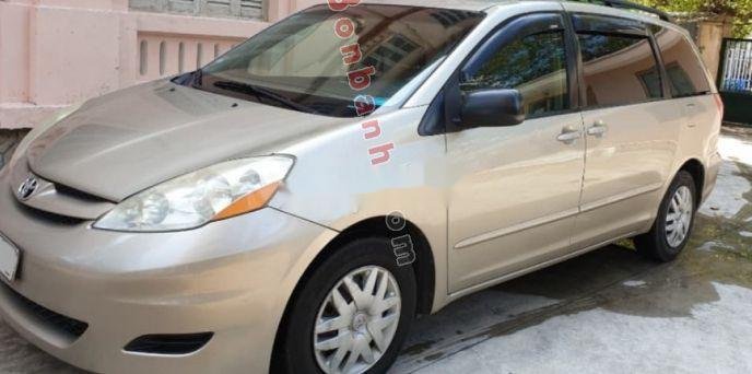 Toyota Sienna 2009 - Cần bán xe Toyota Sienna đời 2009, màu vàng chính chủ giá cạnh tranh