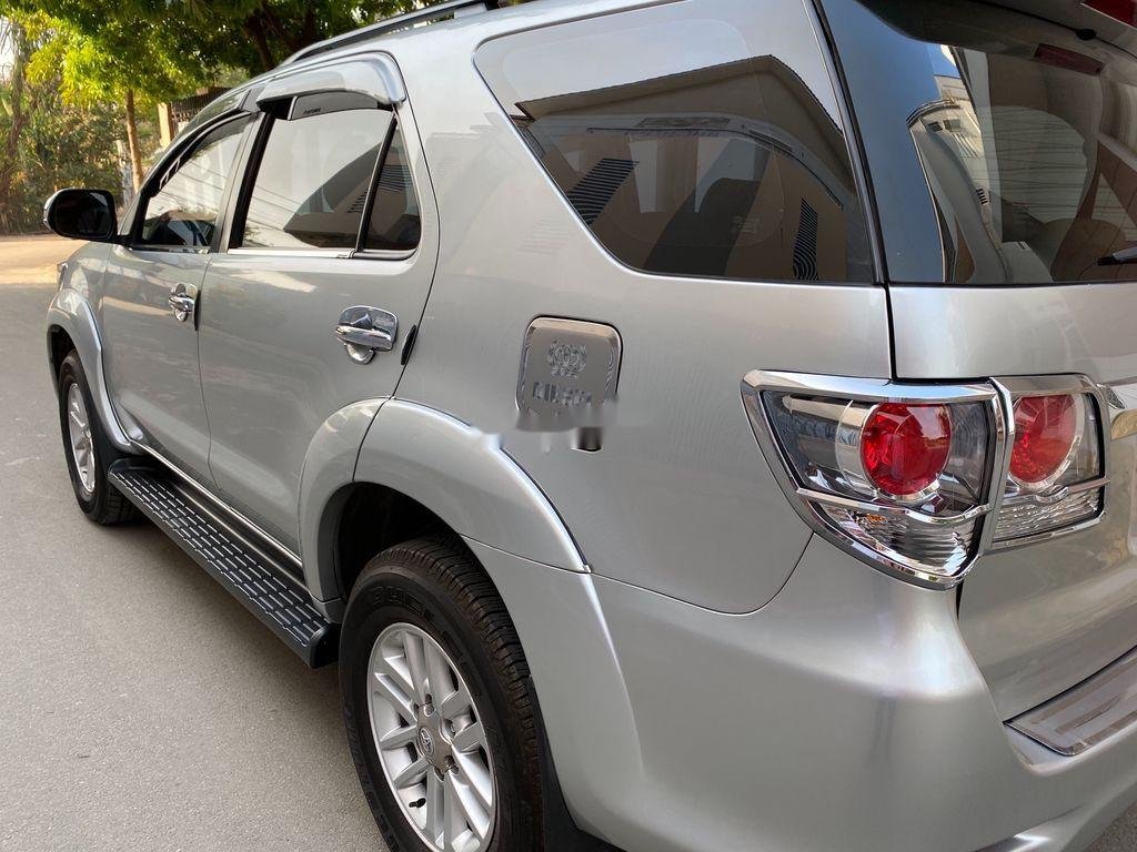 Toyota Fortuner   2014 - Cần bán xe Toyota Fortuner sản xuất 2014, màu bạc chính chủ, 709 triệu