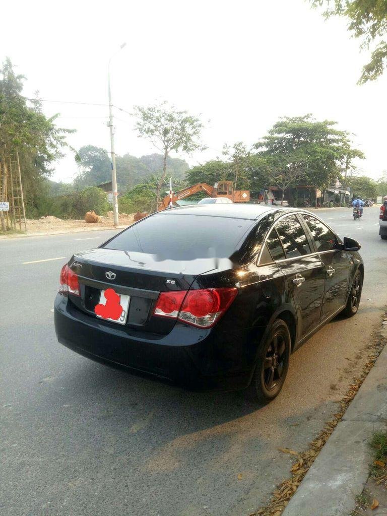 Chevrolet Cruze    2010 - Bán Chevrolet Cruze 2010, màu đen  