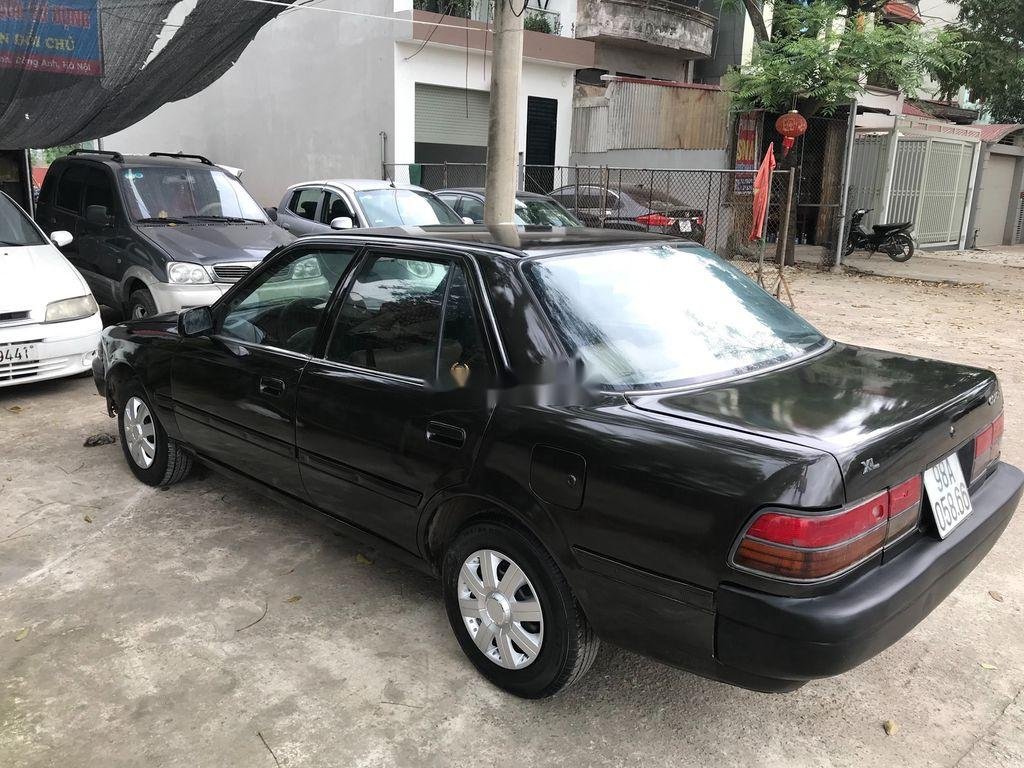 Toyota Corolla   1990 - Cần bán xe Toyota Corolla đời 1990, màu đen, nhập khẩu nguyên chiếc