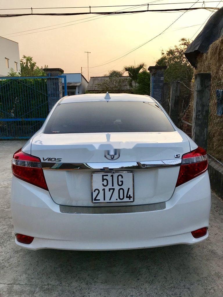 Toyota Vios   G 2016 - Bán ô tô Toyota Vios G năm 2016, màu trắng xe gia đình