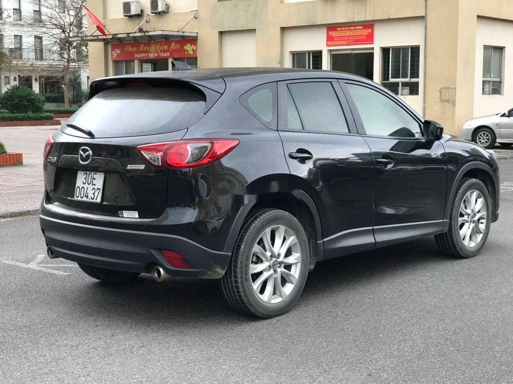 Mazda CX 5 2015 - Cần bán lại xe Mazda CX 5 sản xuất năm 2015, màu đen