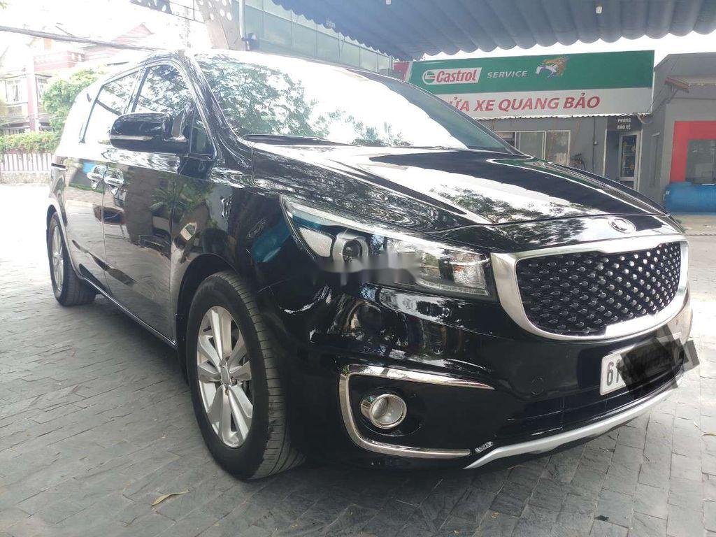 Kia Sedona 2015 - Bán ô tô Kia Sedona đời 2015, màu đen