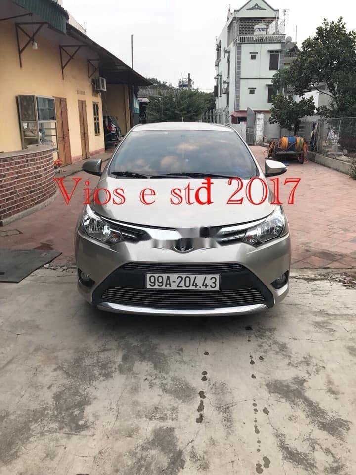 Toyota Vios 2017 - Bán ô tô Toyota Vios AT đời 2017, màu vàng cát, giá 460 triệu