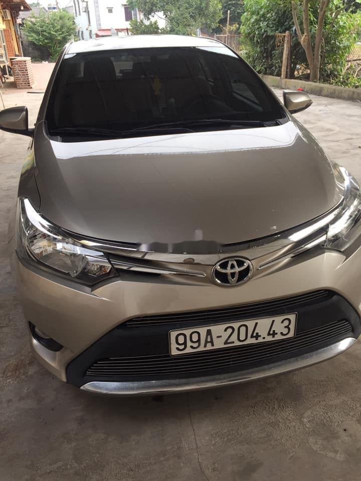 Toyota Vios 2017 - Bán ô tô Toyota Vios AT đời 2017, màu vàng cát, giá 460 triệu