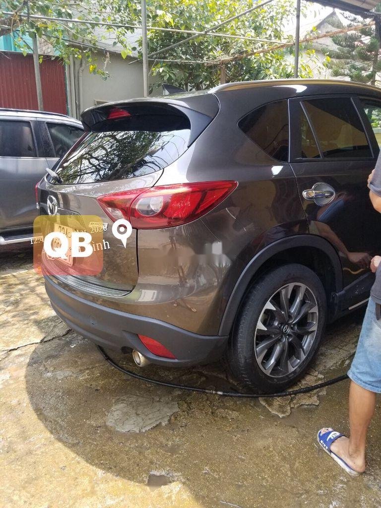 Mazda CX 5 2016 - Cần bán xe Mazda CX 5 năm sản xuất 2016, màu nâu, 650 triệu