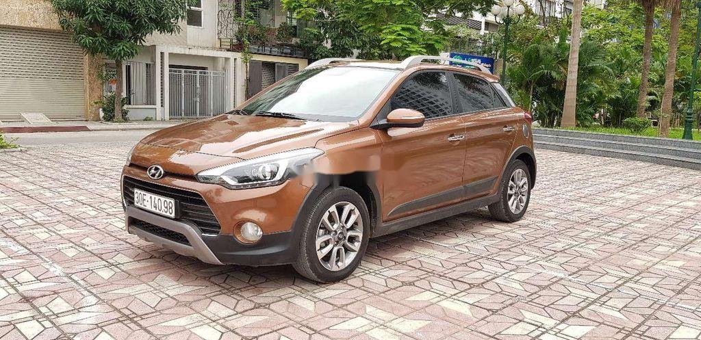 Hyundai i20 Active  1.4 AT 2015 - Cần bán gấp Hyundai i20 Active 1.4 AT 2015, màu vàng đồng, xe nhập, giá 485tr