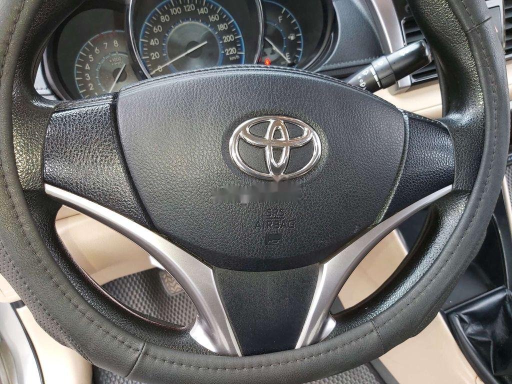 Toyota Vios 2015 - Bán ô tô Toyota Vios MT đời 2015, màu bạc giá cạnh tranh