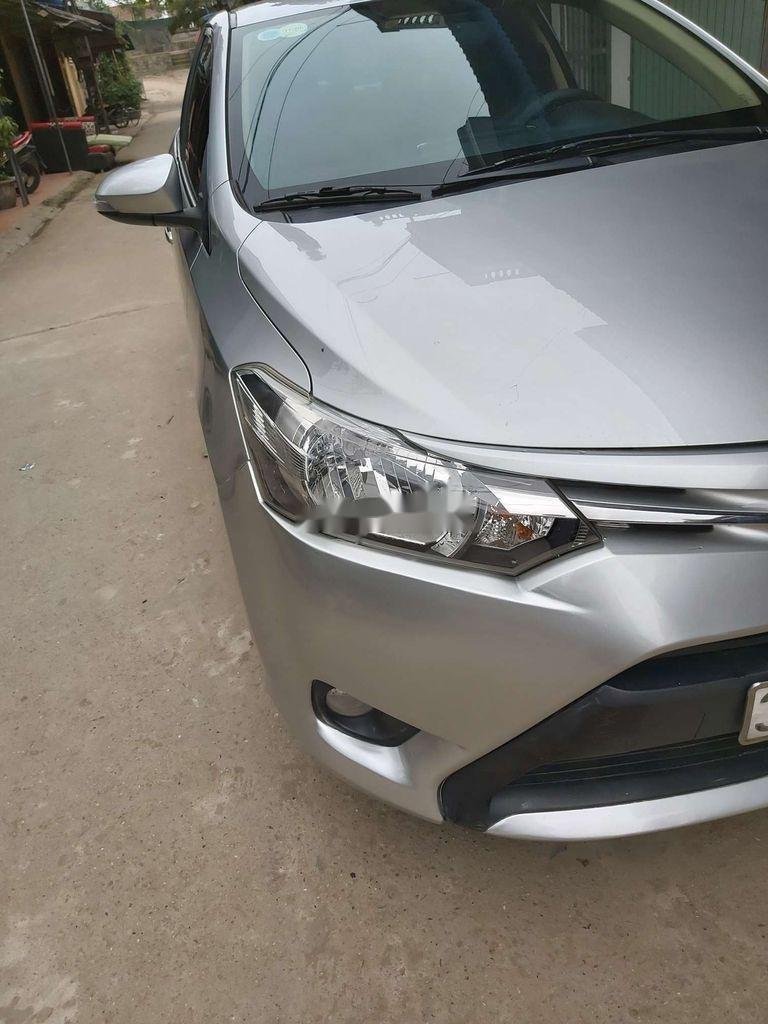 Toyota Vios 2015 - Bán ô tô Toyota Vios MT đời 2015, màu bạc giá cạnh tranh