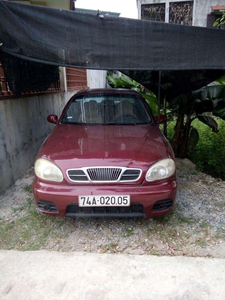 Daewoo Lanos 2001 - Cần bán gấp Daewoo Lanos sản xuất 2001, màu đỏ