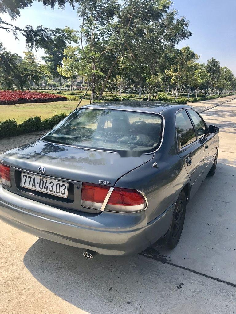 Mazda 626     1997 - Cần bán gấp Mazda 626 sản xuất 1997, màu xám, nhập khẩu số sàn