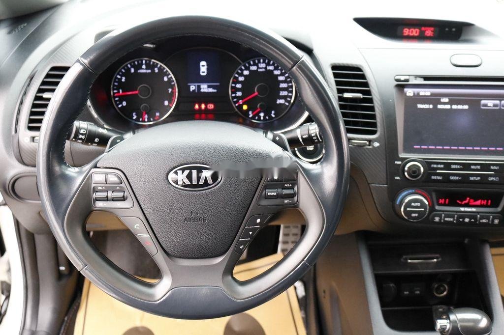 Kia K3 2015 - Cần bán lại xe Kia K3 đời 2015, màu trắng số tự động, 463tr
