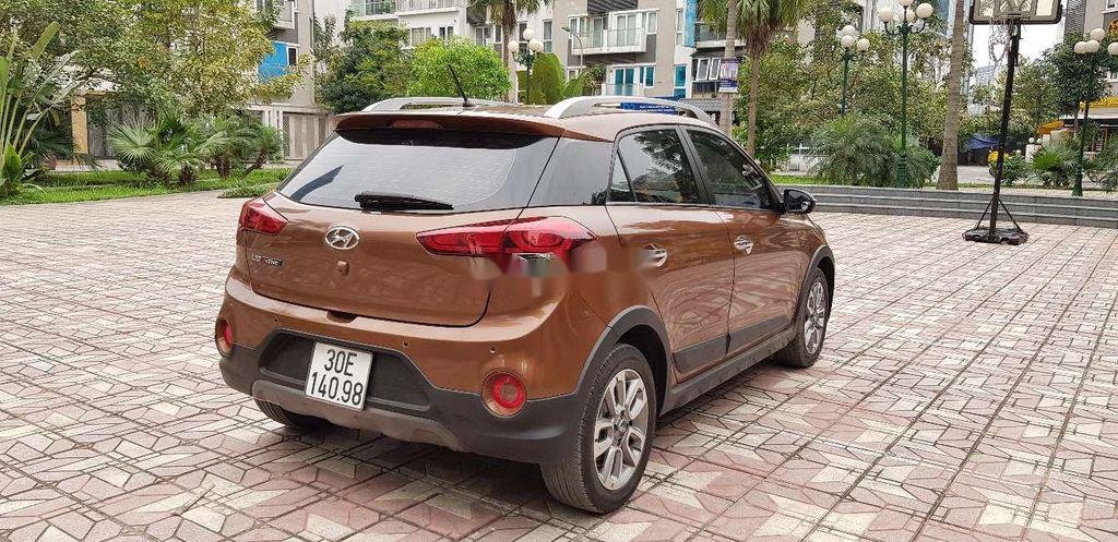 Hyundai i20 Active  1.4 AT 2015 - Cần bán gấp Hyundai i20 Active 1.4 AT 2015, màu vàng đồng, xe nhập, giá 485tr