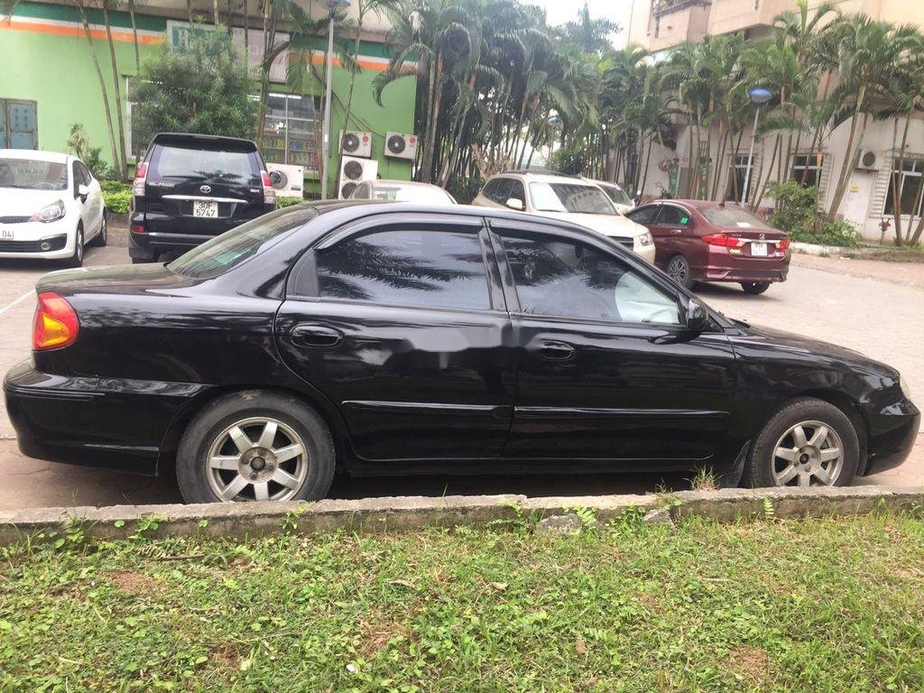 Kia Spectra 2003 - Bán xe Kia Spectra sản xuất 2003, màu đen, 95 triệu