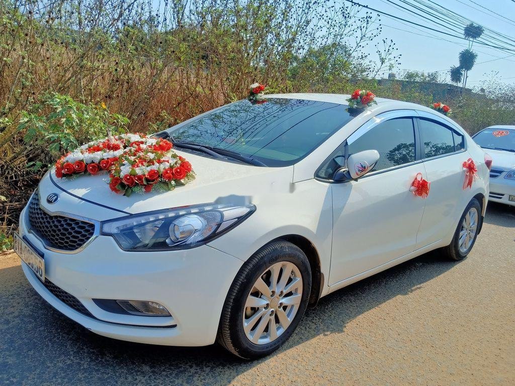 Kia K3    2015 - Bán Kia K3 sản xuất năm 2015, màu trắng