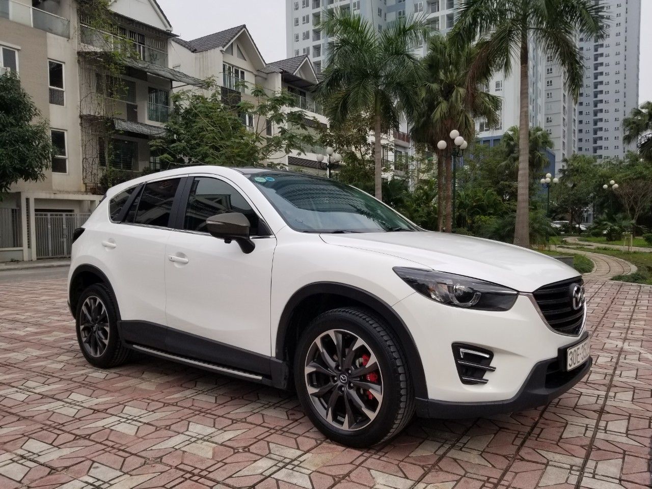 Mazda CX 5 2016 - Cần bán lại chiếc Mazda CX5 Signature Pre 2.5AT FWD, đời 2016, màu trắng, giá tốt