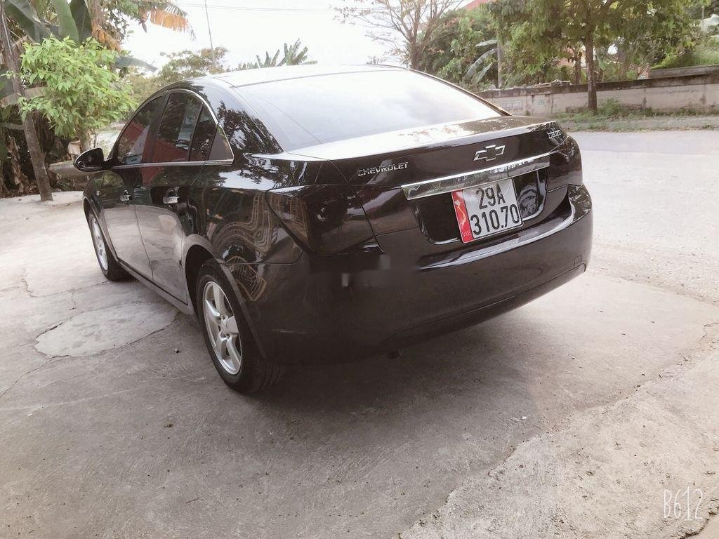 Chevrolet Cruze   2011 - Cần bán Chevrolet Cruze đời 2011, màu đen, chính chủ, giá 260tr