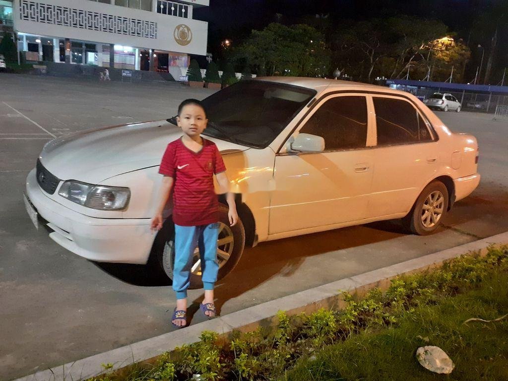 Toyota Corolla    1999 - Bán Toyota Corolla năm 1999, màu trắng, nhập khẩu