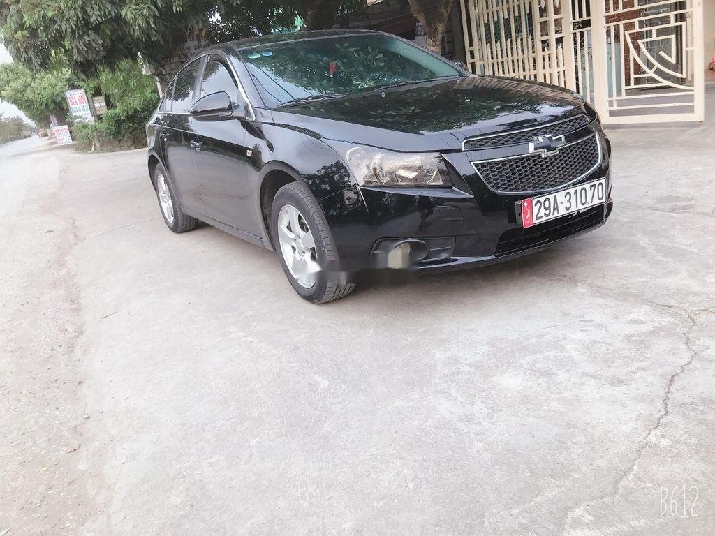 Chevrolet Cruze   2011 - Cần bán Chevrolet Cruze đời 2011, màu đen, chính chủ, giá 260tr