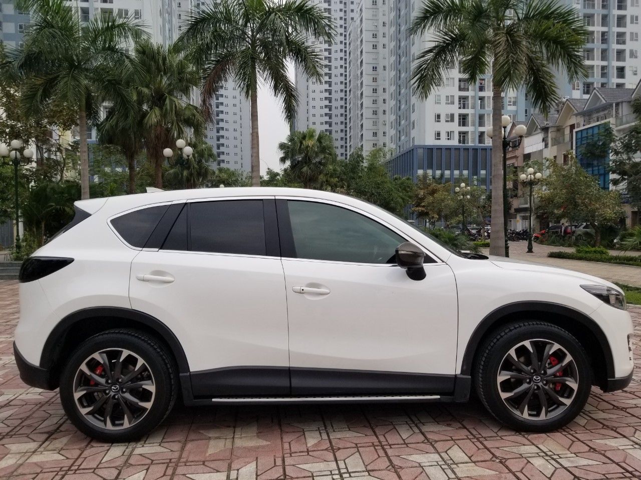 Mazda CX 5 2016 - Cần bán lại chiếc Mazda CX5 Signature Pre 2.5AT FWD, đời 2016, màu trắng, giá tốt