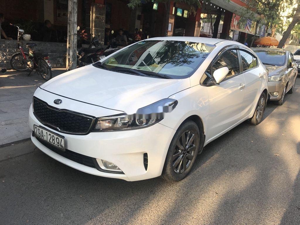 Kia Cerato  MT  2016 - Bán Kia Cerato MT 2016, màu trắng xe gia đình, giá 410tr