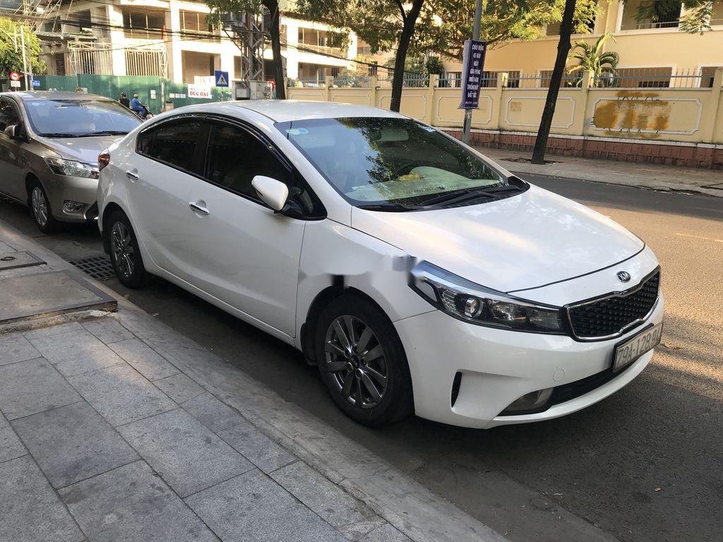 Kia Cerato  MT  2016 - Bán Kia Cerato MT 2016, màu trắng xe gia đình, giá 410tr