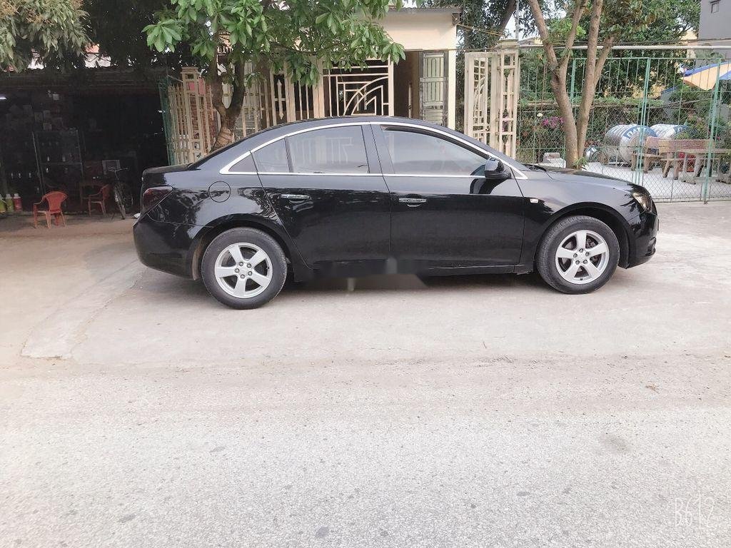 Chevrolet Cruze   2011 - Cần bán Chevrolet Cruze đời 2011, màu đen, chính chủ, giá 260tr