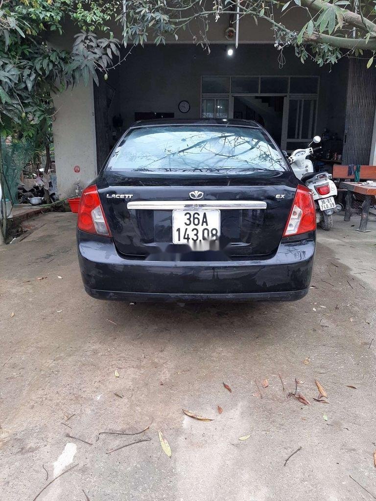 Daewoo Lacetti 2009 - Bán ô tô Daewoo Lacetti đời 2009, màu đen xe gia đình