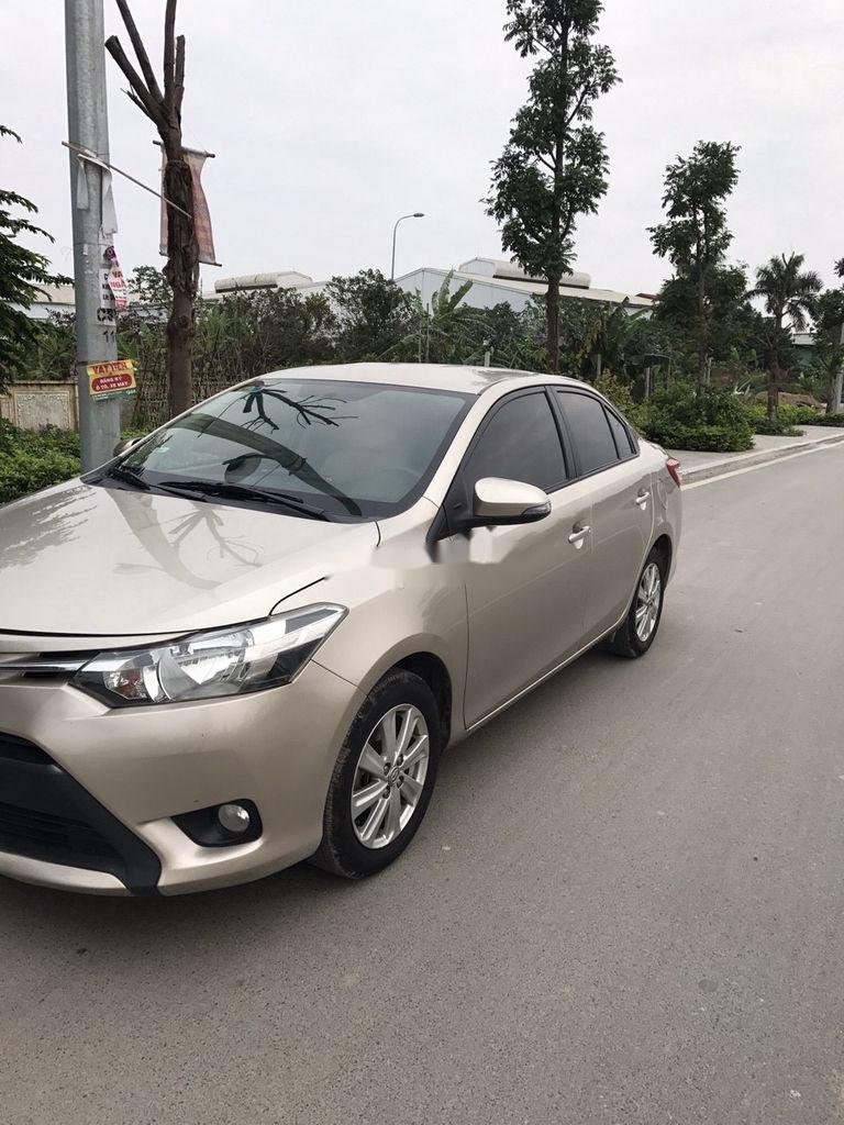 Toyota Vios 2017 - Bán Toyota Vios E MT sản xuất 2017, màu vàng cát số sàn