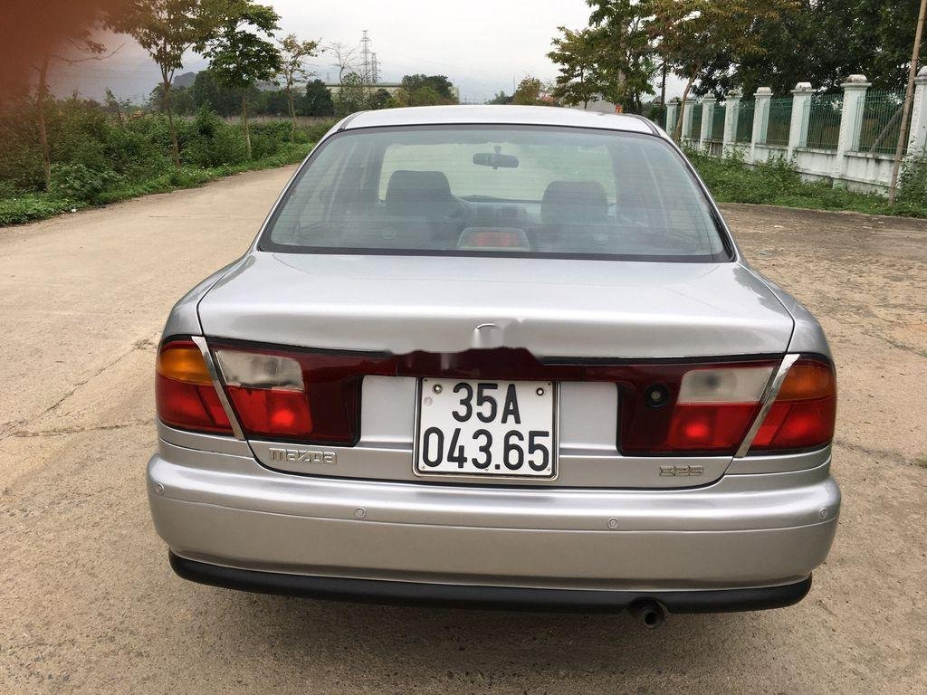 Mazda 323 1999 - Cần bán gấp Mazda 323 năm 1999, màu bạc, giá chỉ 85 triệu