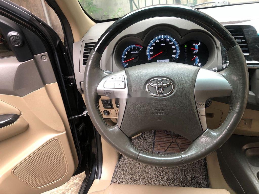 Toyota Fortuner   2014 - Bán ô tô Toyota Fortuner sản xuất 2014, màu đen chính chủ