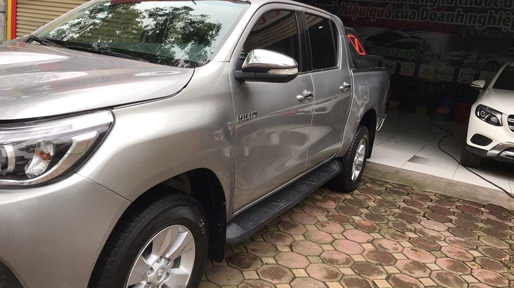 Toyota Hilux 2016 - Cần bán lại xe Toyota Hilux 3.0 AT sản xuất năm 2016, 590 triệu