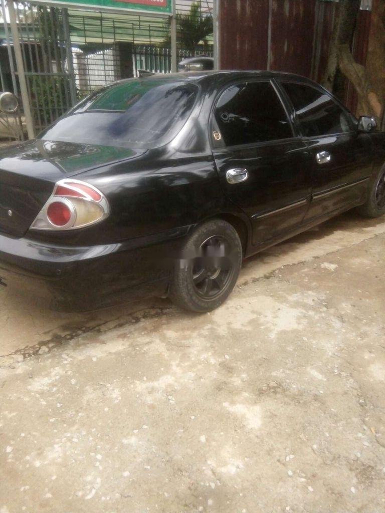 Kia Spectra 2003 - Cần bán lại xe Kia Spectra đời 2003, màu đen, 85tr