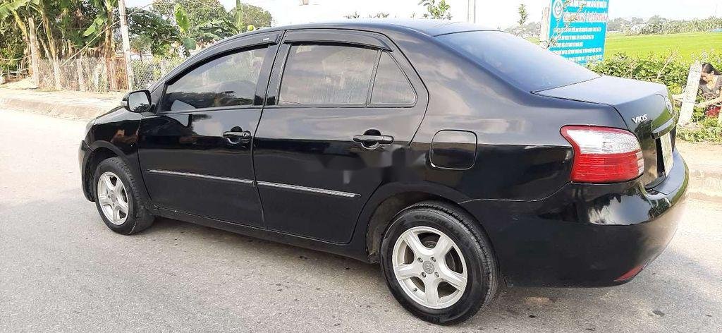 Toyota Vios 2009 - Cần bán xe Toyota Vios năm 2009, màu đen xe gia đình