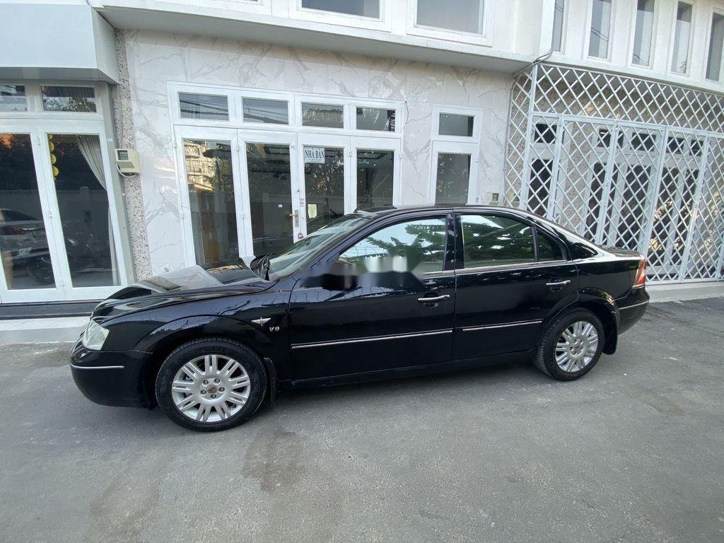 Ford Mondeo 2004 - Bán Ford Mondeo đời 2004, màu đen, 165tr