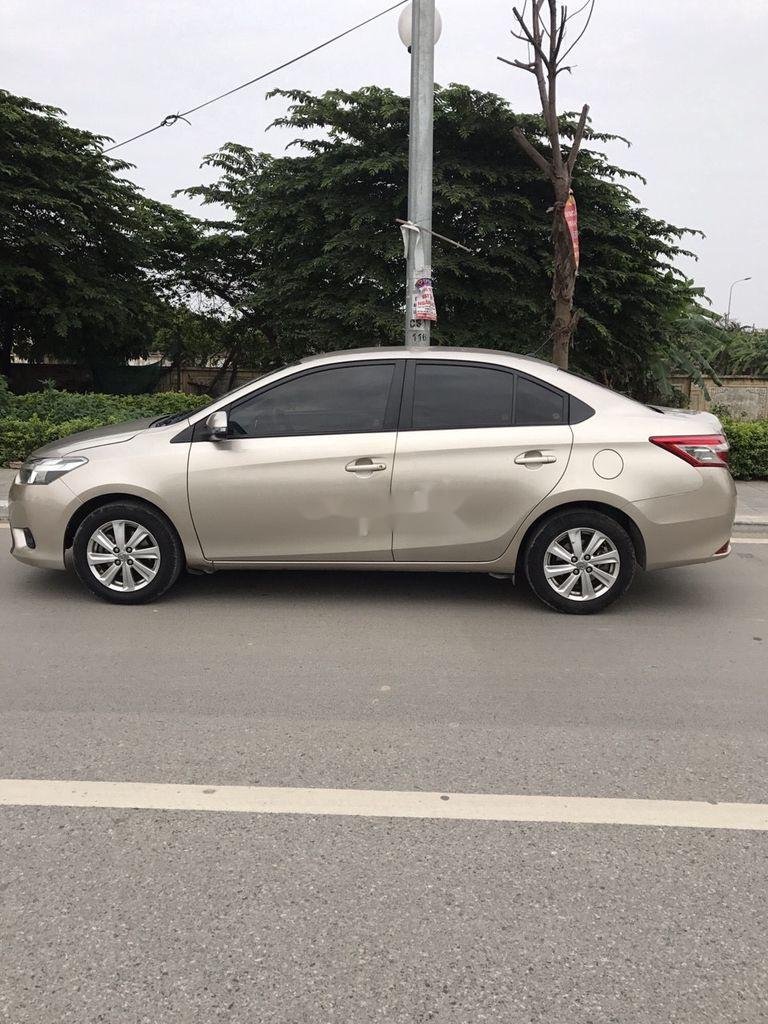 Toyota Vios 2017 - Bán Toyota Vios E MT sản xuất 2017, màu vàng cát số sàn